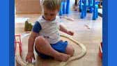 Baby with trains