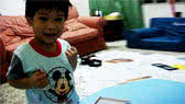 Little Gregory learning the colours in English and Spanish
